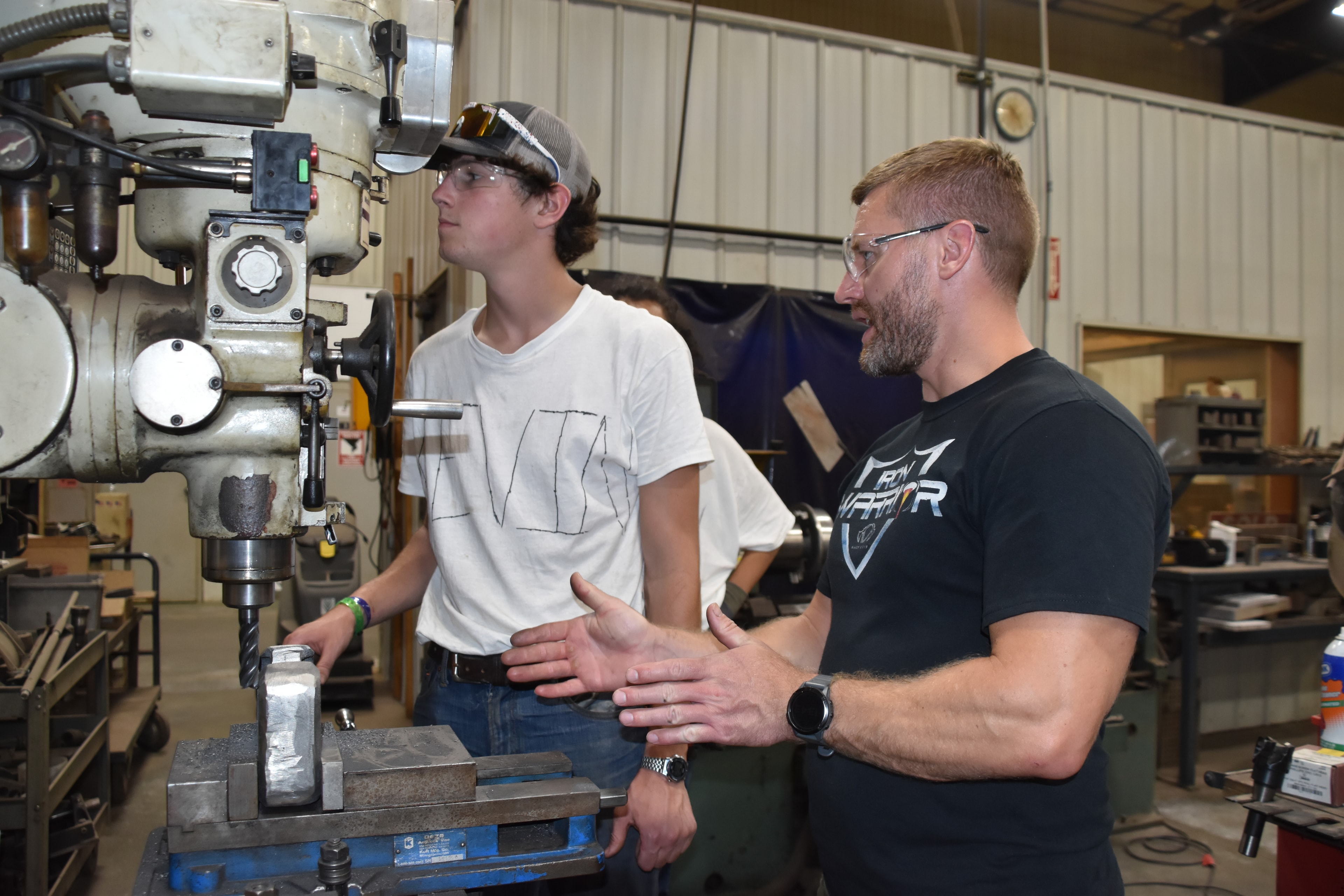 Experienced professional mentoring and working alongside Iron Warrior Academy students